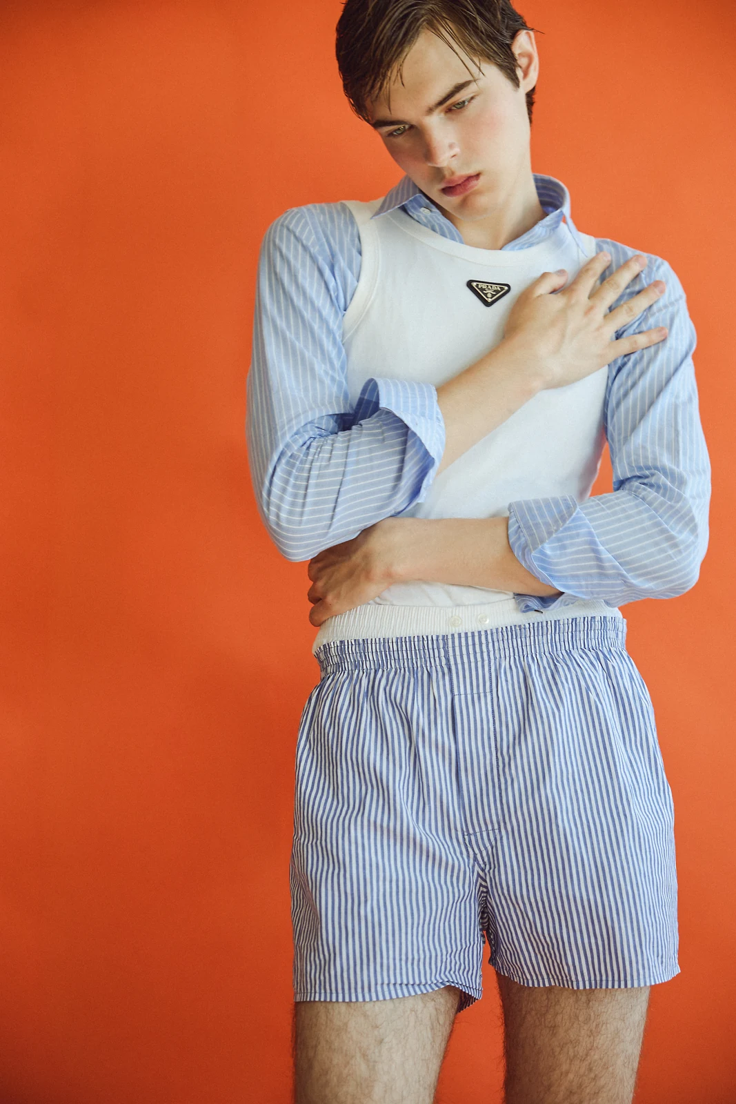 Striped Prada styling against orange for MMScene August 2026 — styling by Manel Guisado