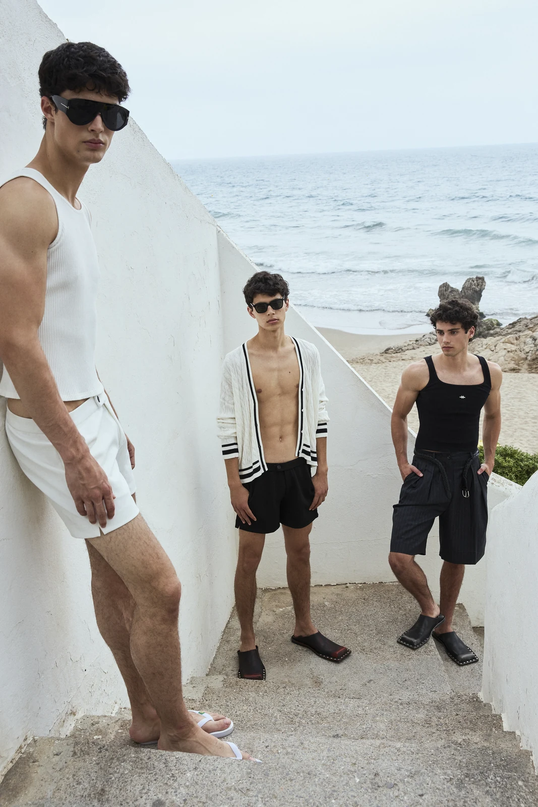 Seaside group in monochrome looks for MMScene July 2026 — styling by Manel Guisado