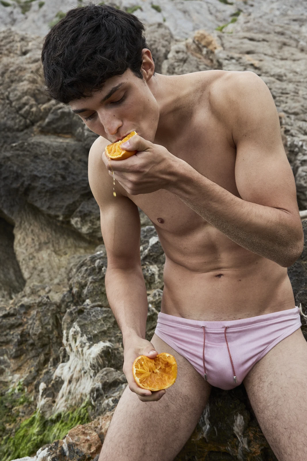 Swimwear portrait with orange for MMScene July 2026 — styling by Manel Guisado